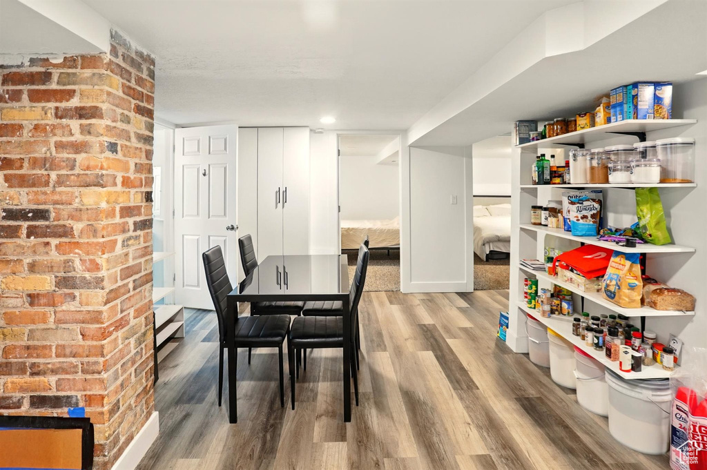 Dining area with wood finished floors