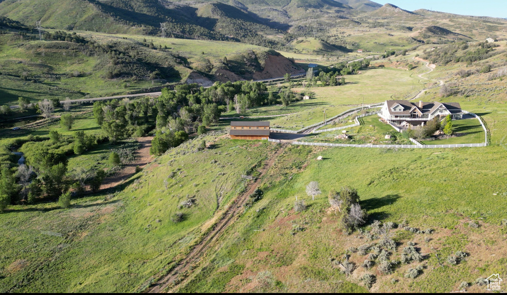Drone / aerial view with a rural view and a mountain view