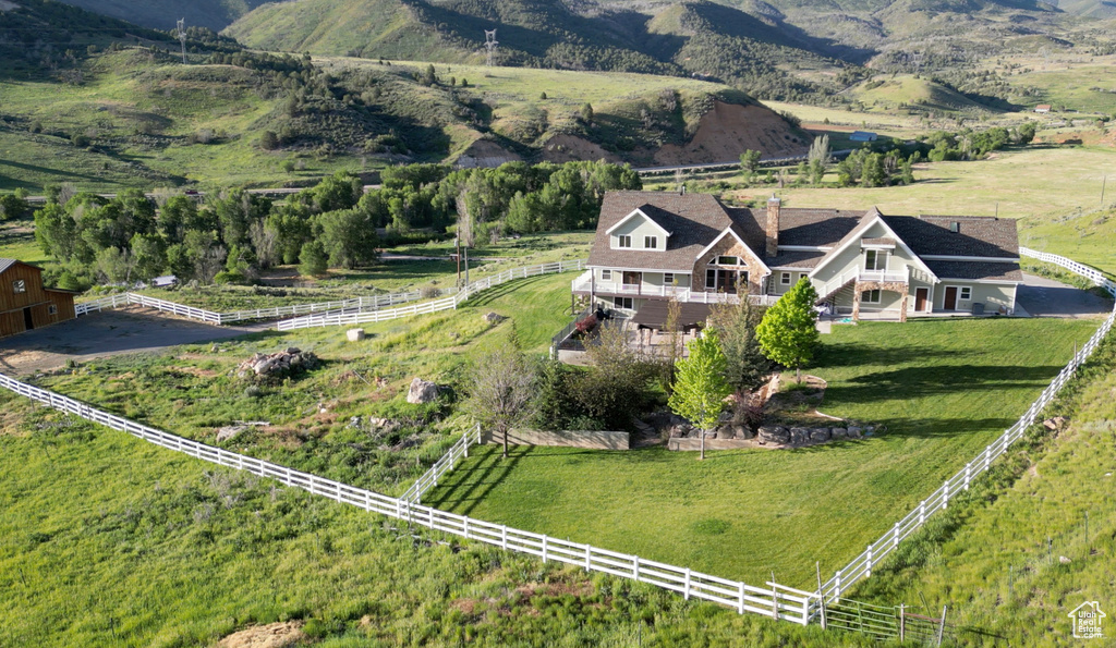 Drone / aerial view featuring a mountain view and a rural view