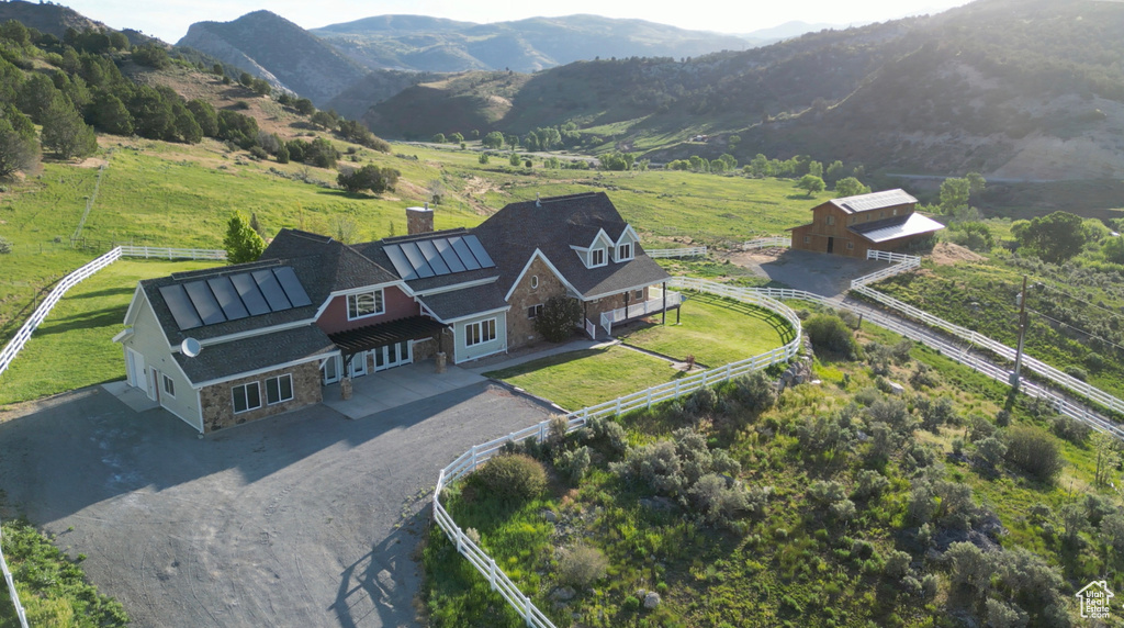 Aerial view with a rural view and a mountain view