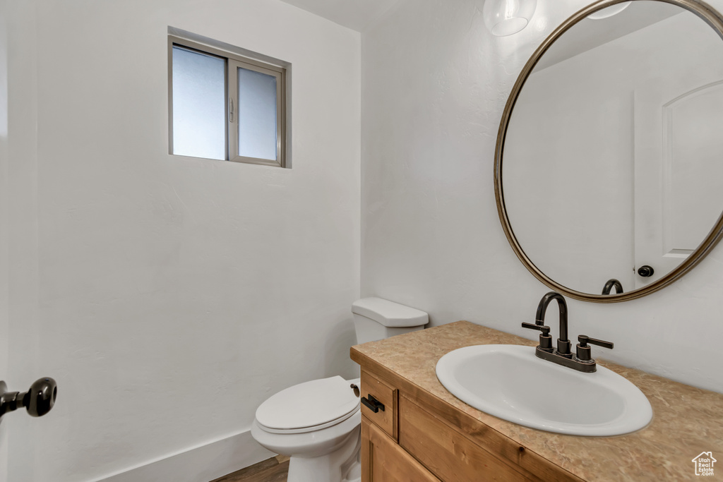 Bathroom with vanity and toilet
