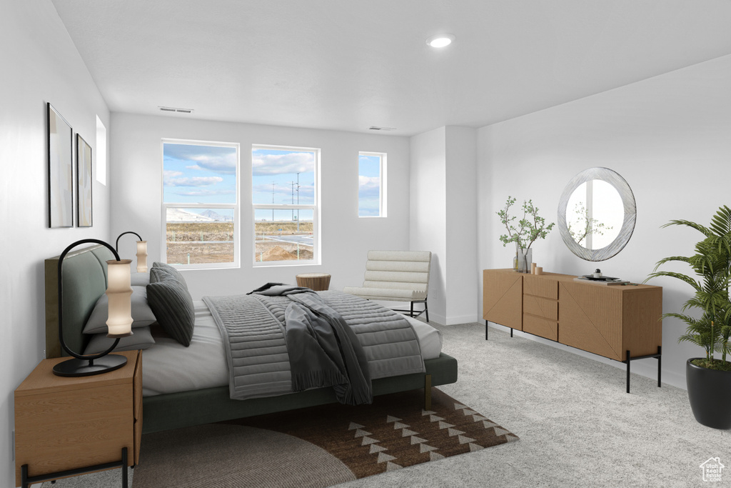 Carpeted bedroom with baseboards, recessed lighting, and visible vents
