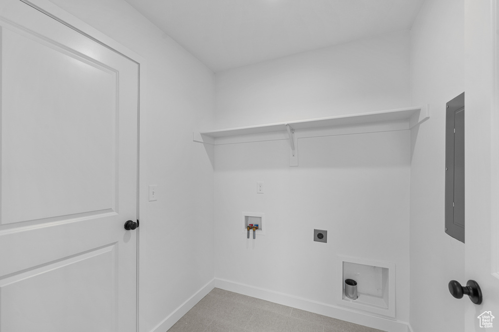 Washroom featuring laundry area, electric panel, electric dryer hookup, baseboards, and hookup for a washing machine