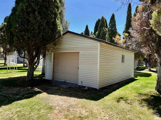 View of outbuilding featuring an outdoor structure