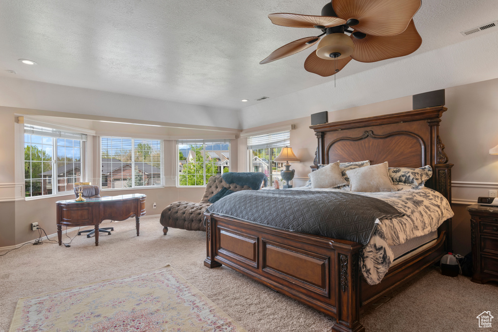 Bedroom with visible vents, baseboards, ceiling fan, recessed lighting, and light colored carpet