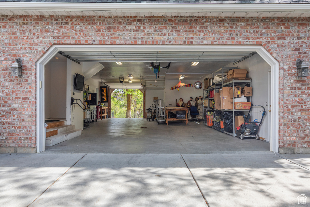 Garage with concrete driveway