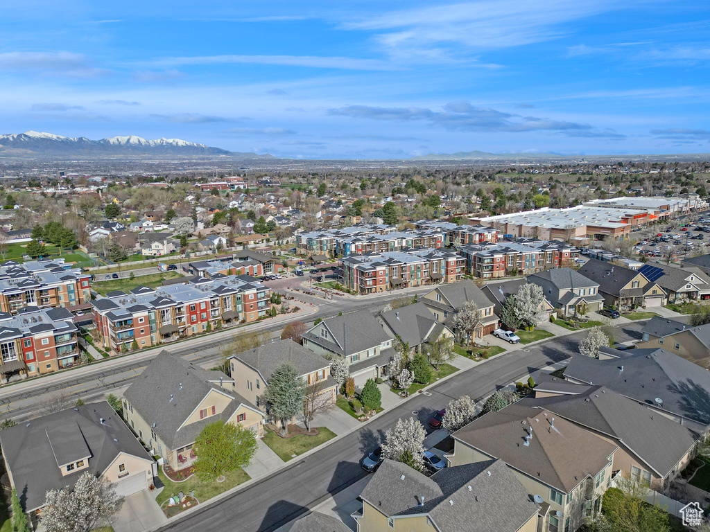 Drone / aerial view with a residential view and a mountain view