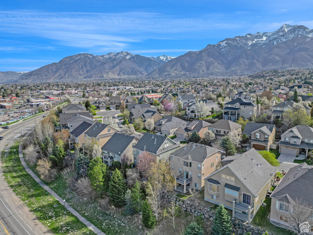 Drone / aerial view with a residential view and a mountain view