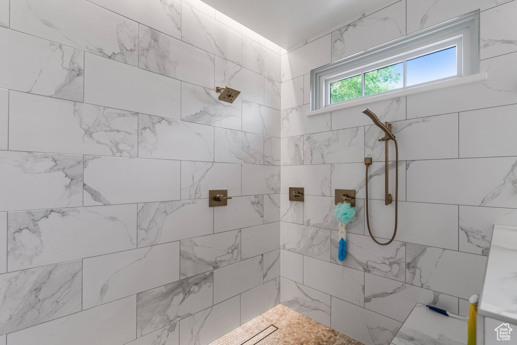 Bathroom with tiled shower