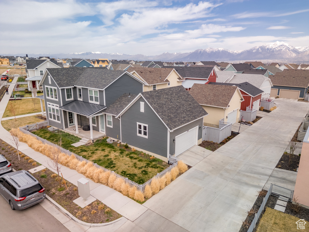 Drone / aerial view with a mountain view and a residential view