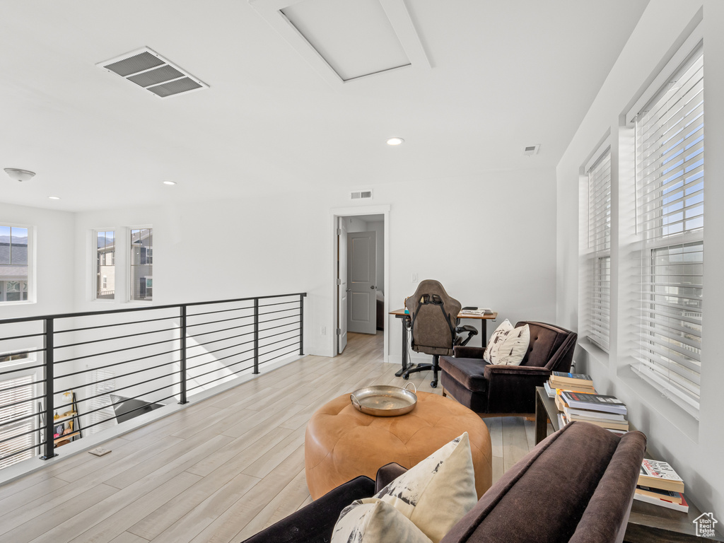 Sitting room featuring recessed lighting, visible vents, attic access, and wood finished floors