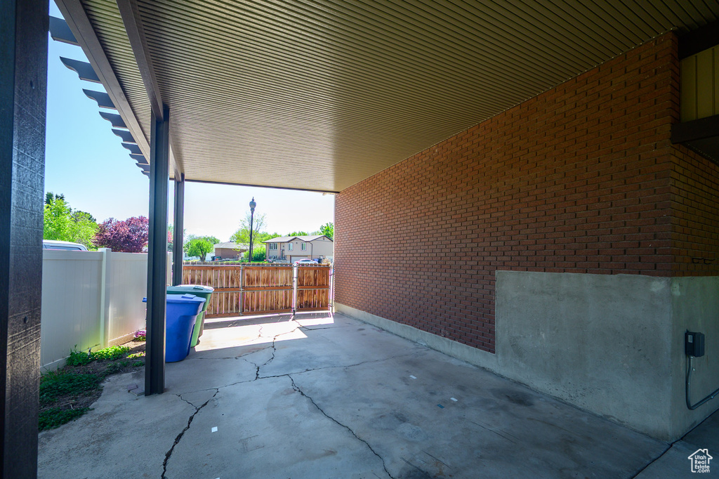 View of patio / terrace featuring fence