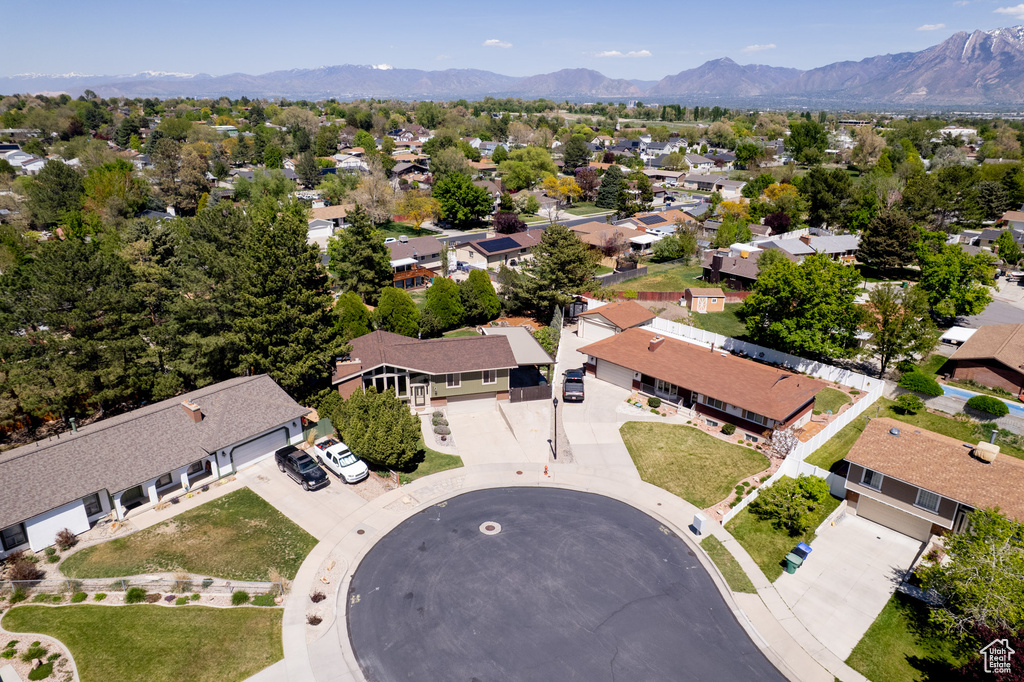 Drone / aerial view with a residential view and a mountain view