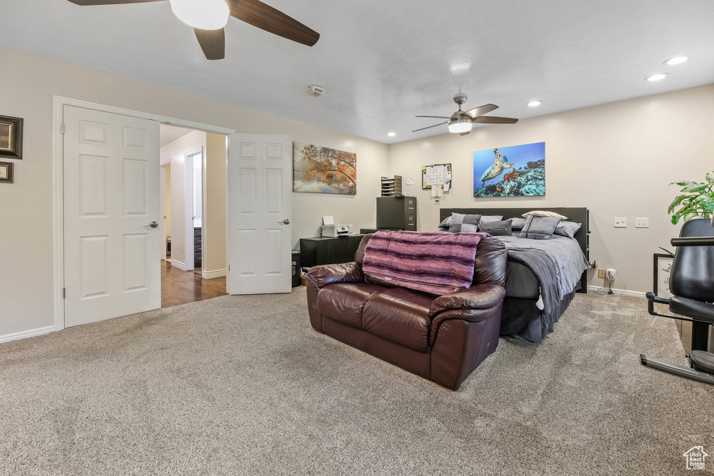 Bedroom featuring carpet floors, recessed lighting, baseboards, and a ceiling fan