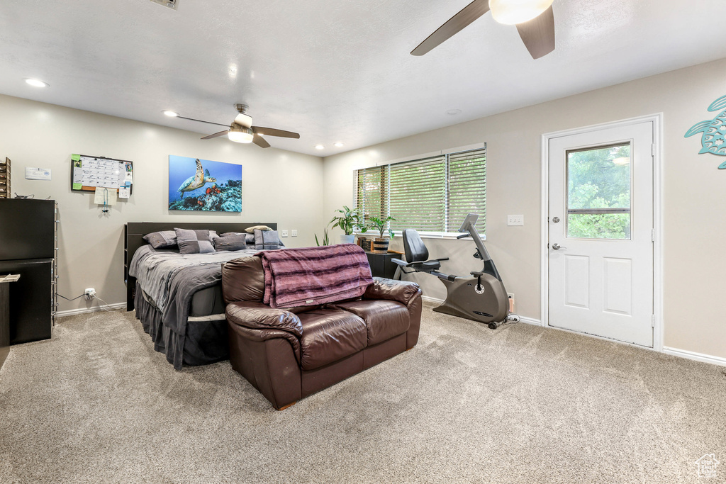 Bedroom with carpet floors, recessed lighting, and baseboards