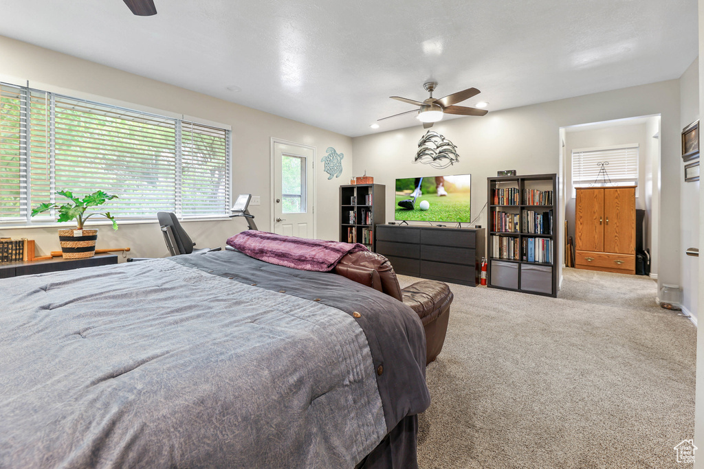 Bedroom with carpet flooring, a ceiling fan, and recessed lighting