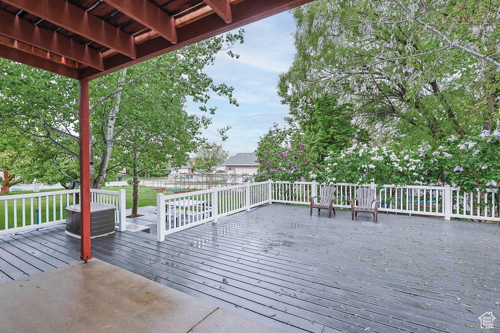 Wooden deck featuring fence
