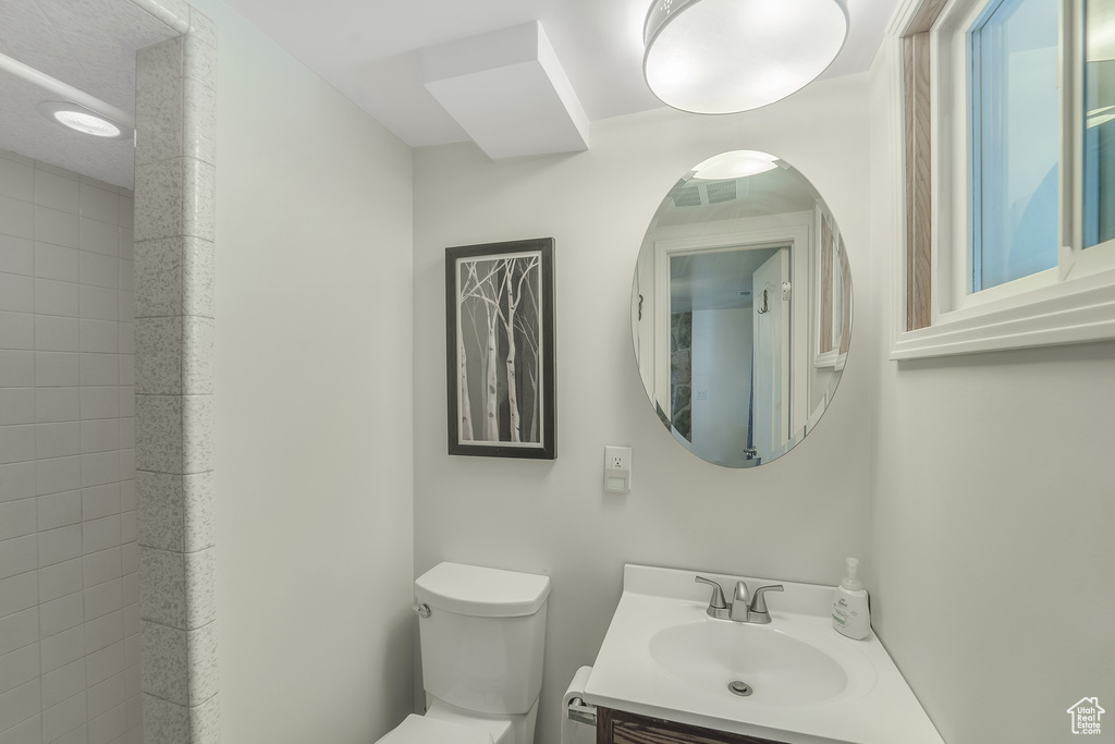Bathroom featuring toilet and vanity