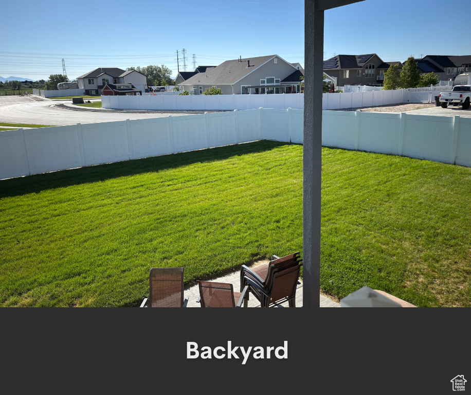 View of yard featuring a residential view
