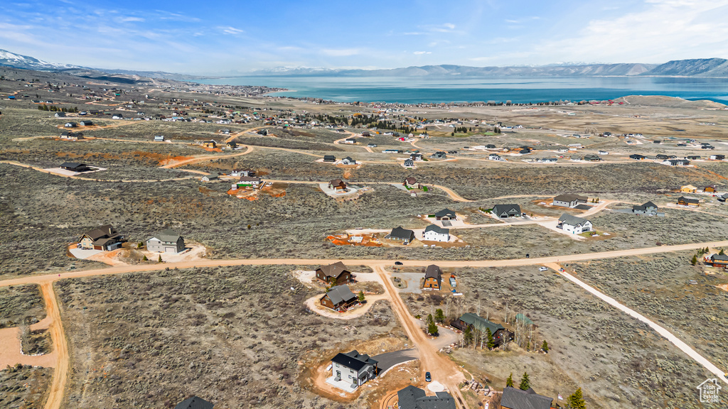 Bird's eye view featuring a water and mountain view