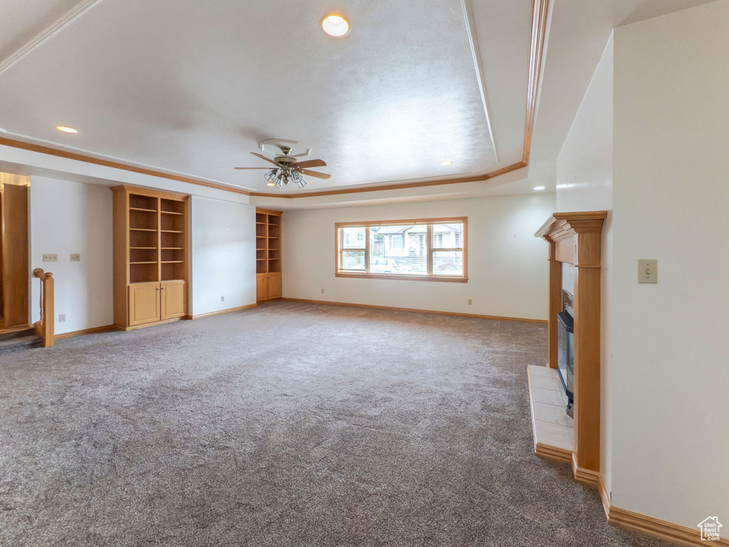 Unfurnished living room with carpet floors, baseboards, a ceiling fan, and recessed lighting