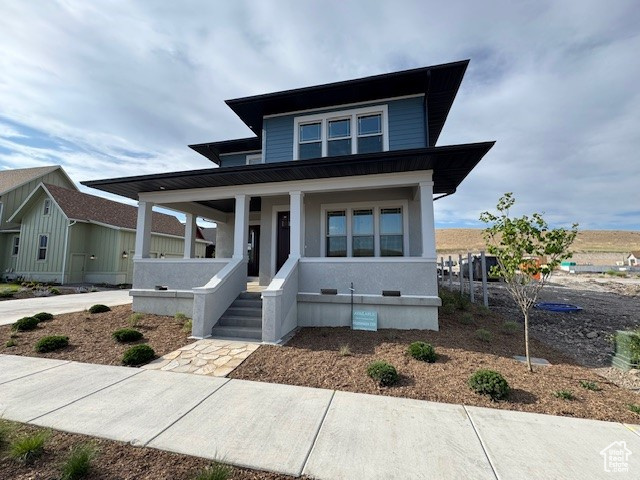 View of front of property featuring a porch