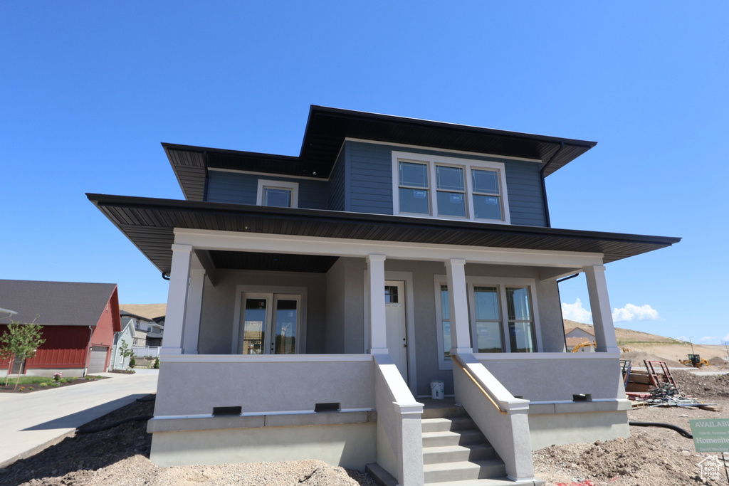 View of front of home with covered porch