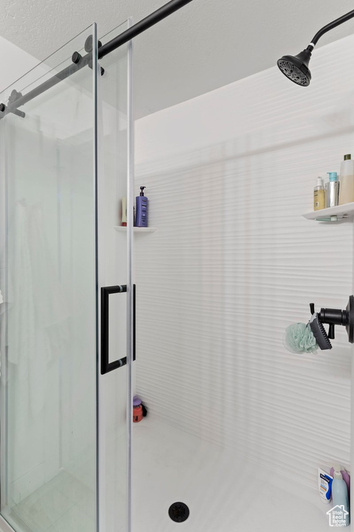 Bathroom featuring a stall shower