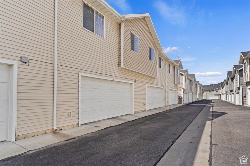 Exterior space with community garages and a residential view