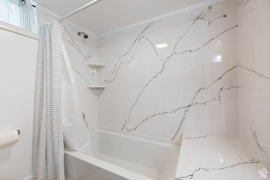 Bathroom with shower / bath combo