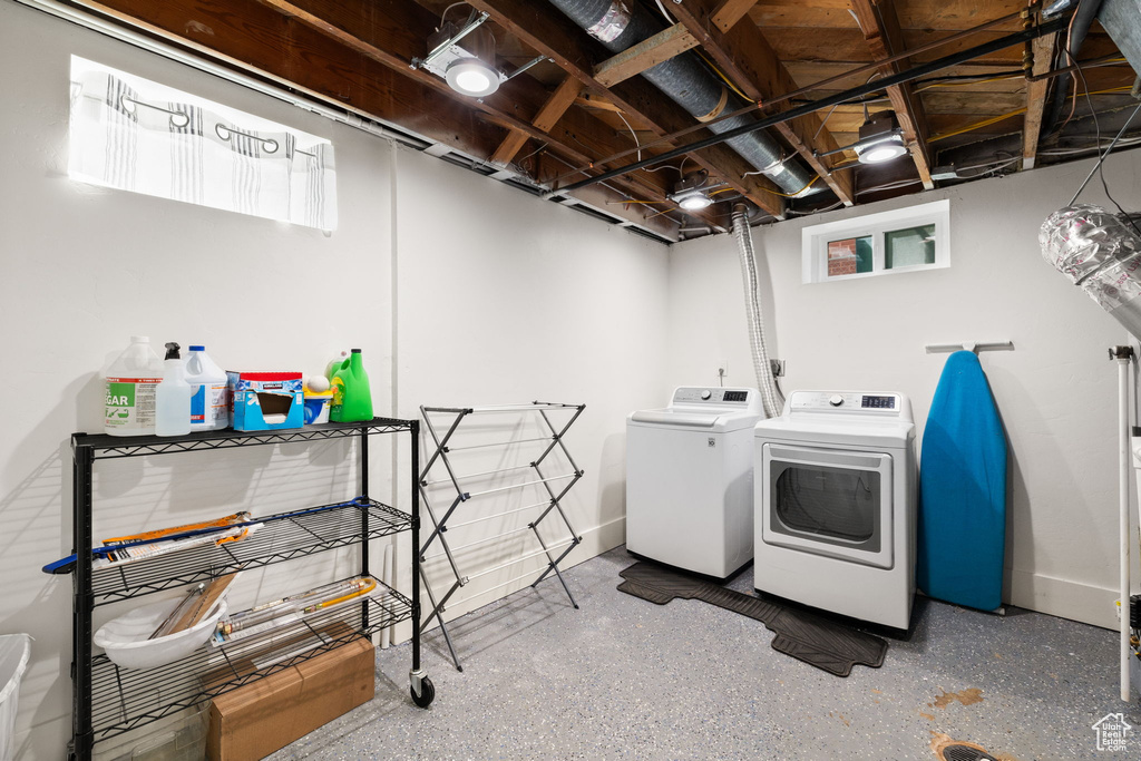 Laundry area with laundry area and washer and clothes dryer