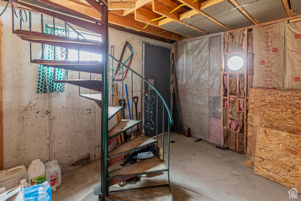 Unfinished basement with stairs