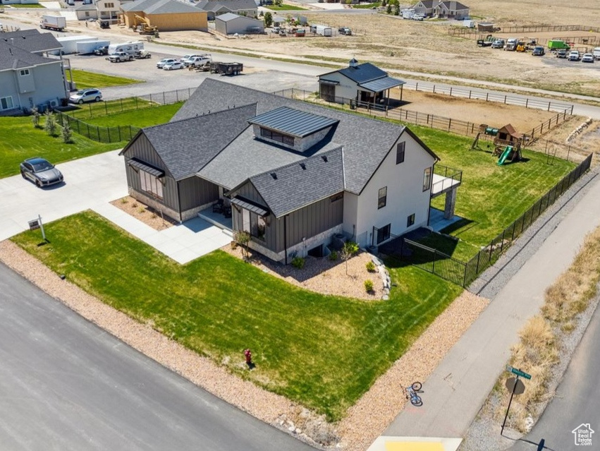 Aerial perspective of suburban area with a mountain backdrop