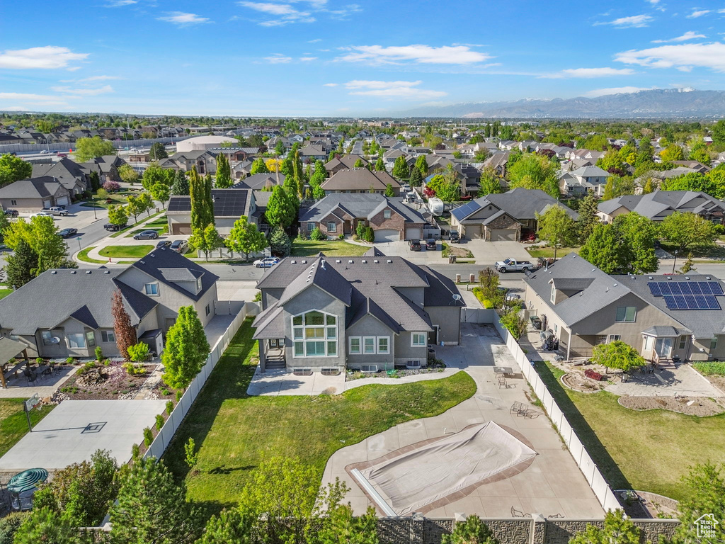 Drone / aerial view featuring a residential view and a mountain view