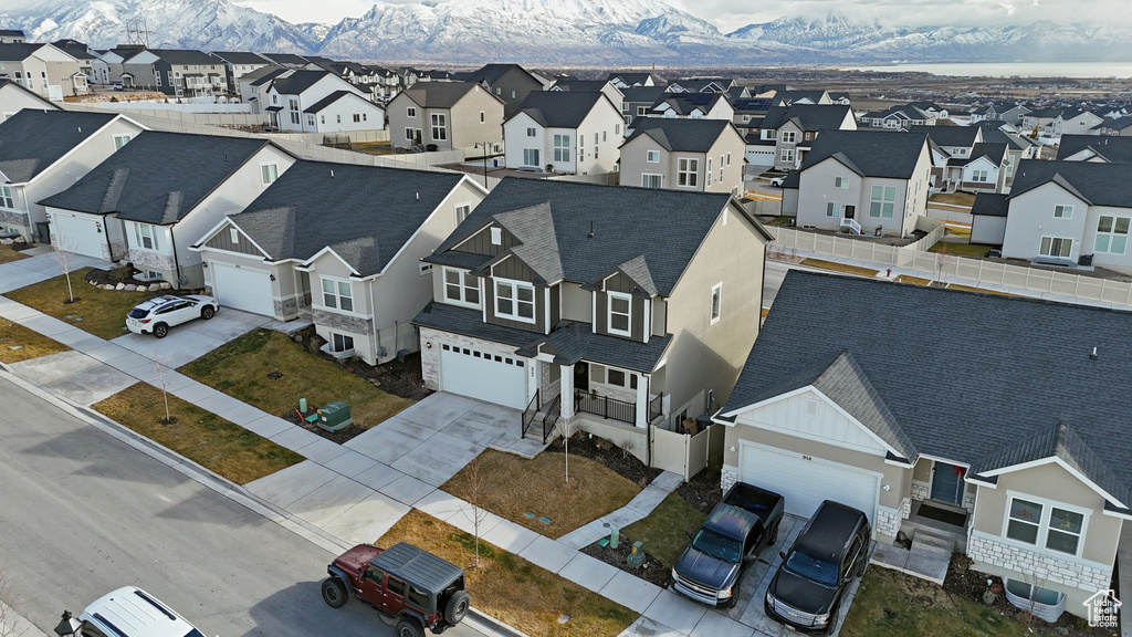 Birds eye view of property featuring a residential view and a mountain view