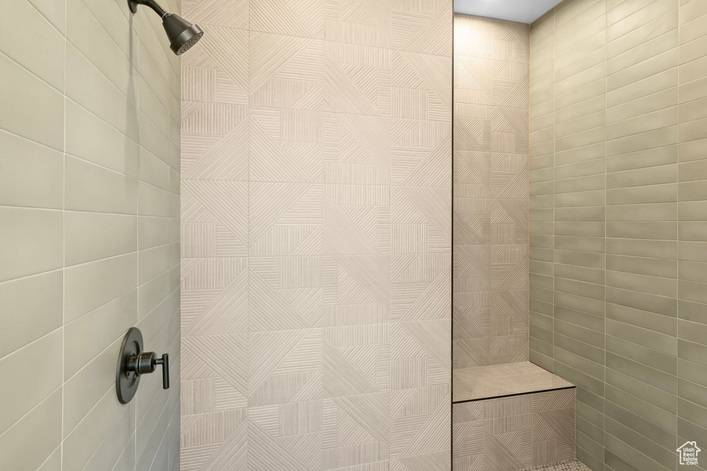 Bathroom with tiled shower