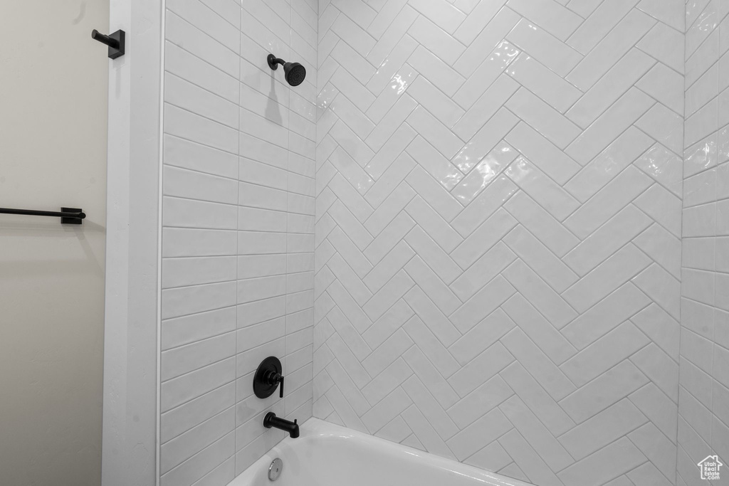 Room details with bathtub / shower combination