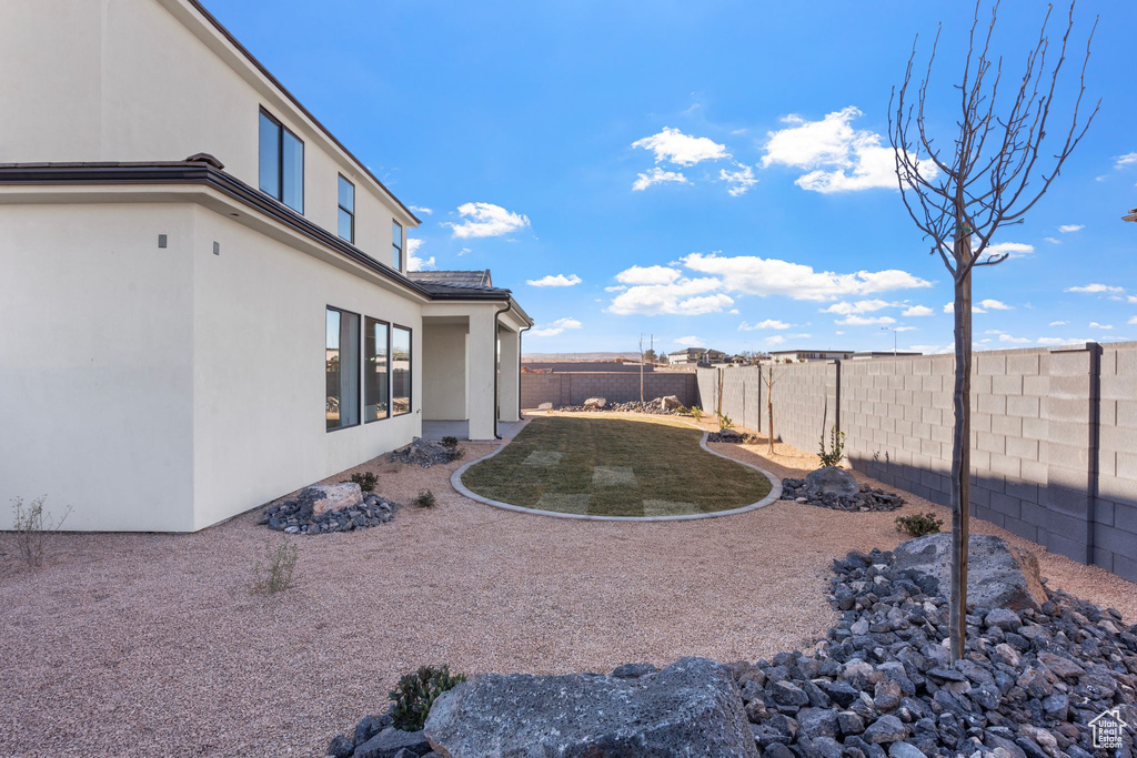 View of yard featuring a fenced backyard