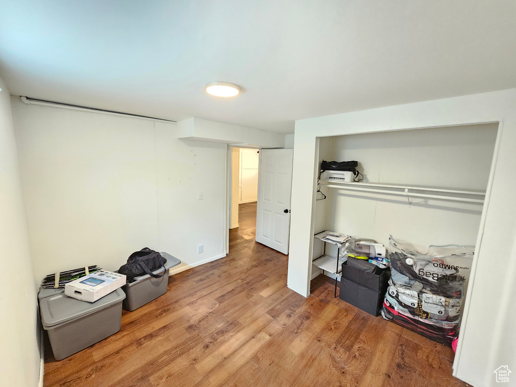 Bedroom with wood finished floors