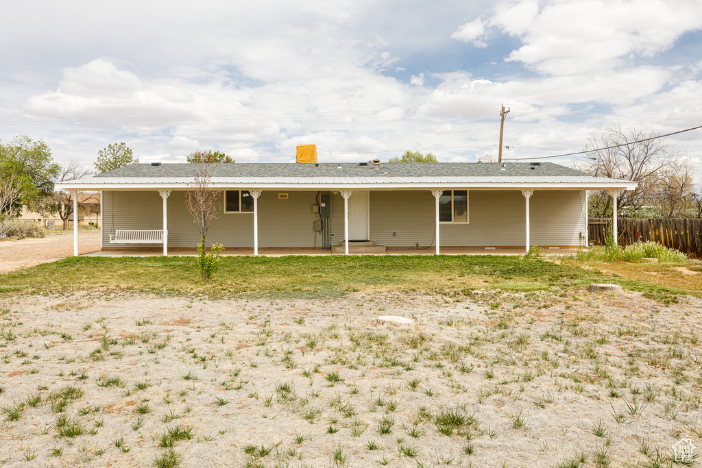 Back of property with fence