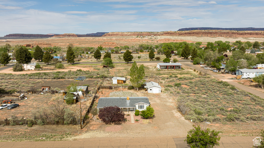 Birds eye view of property featuring a rural view