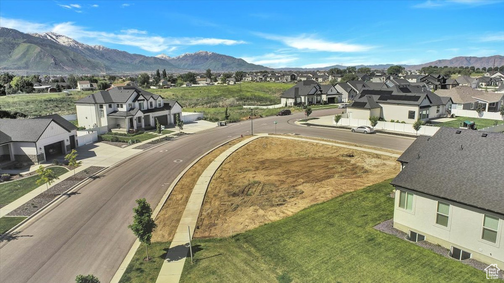 Bird's eye view featuring a mountain view and a residential view