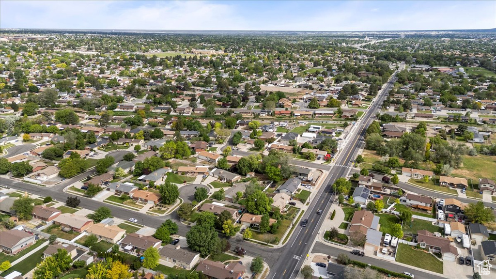 Aerial view of property\'s location with nearby suburban area