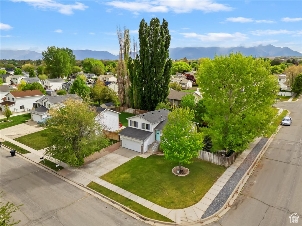 Birds eye view of property featuring a residential view and a mountain view