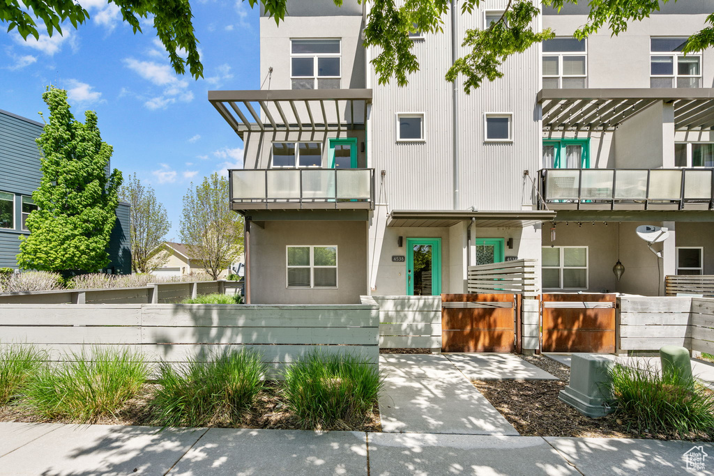 Exterior space with a fenced front yard