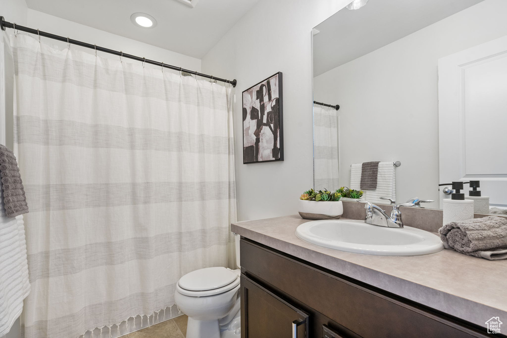 Bathroom with vanity and toilet