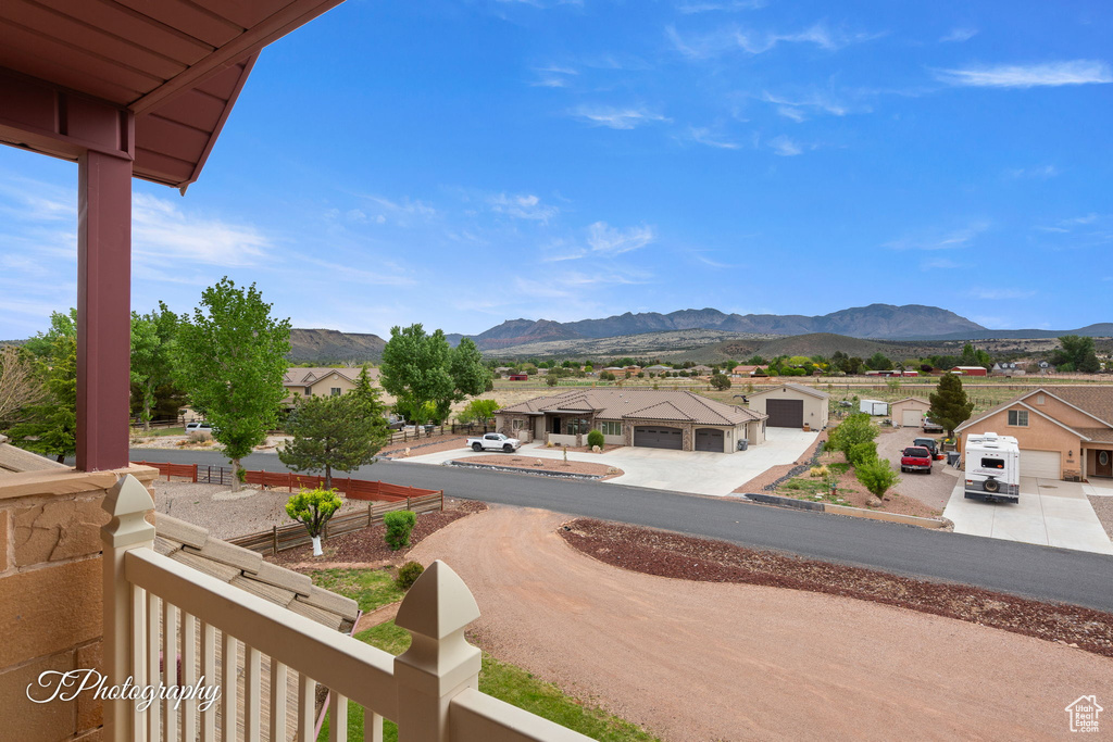 Property view of mountains featuring a residential view