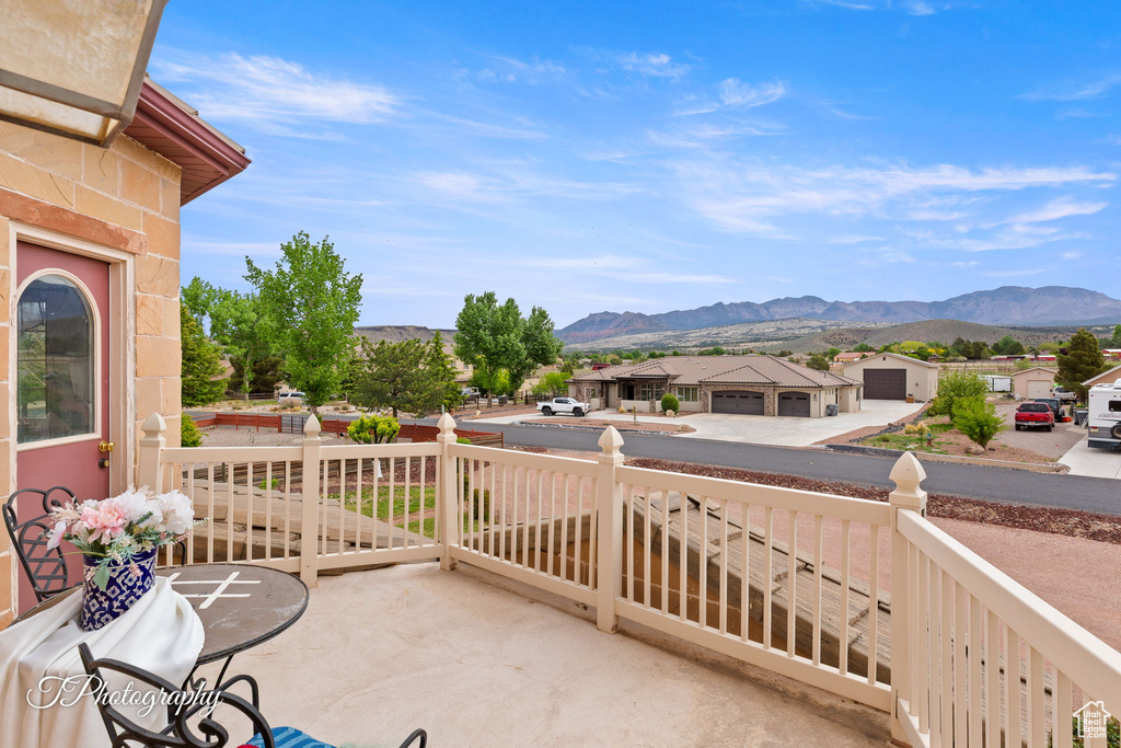 View of patio featuring a residential view and a mountain view
