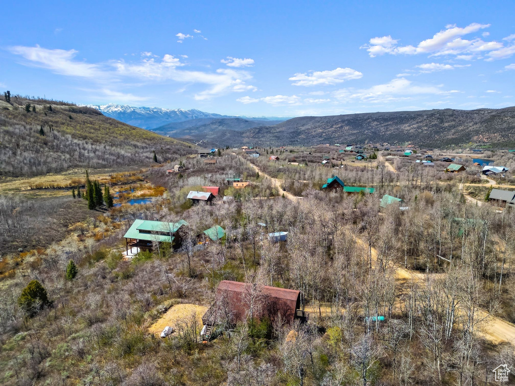 Birds eye view of property featuring a mountain view and a rural view