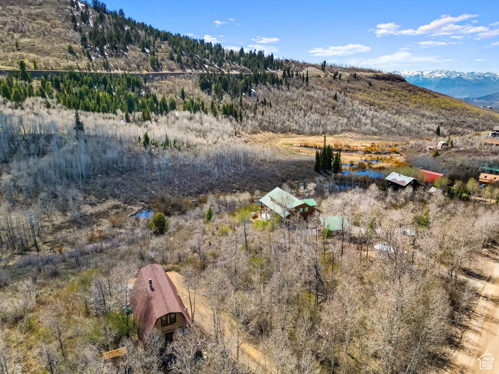 Birds eye view of property featuring a mountain view and a rural view